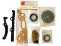 Collection of automotive parts including gears and gaskets on a white background