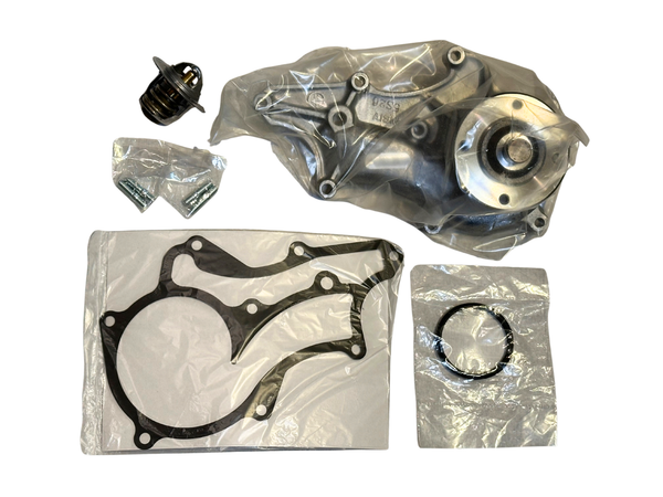 Automotive parts including a water pump, fan clutch studs, gaskets, thermostat, and thermostat seal on a white background