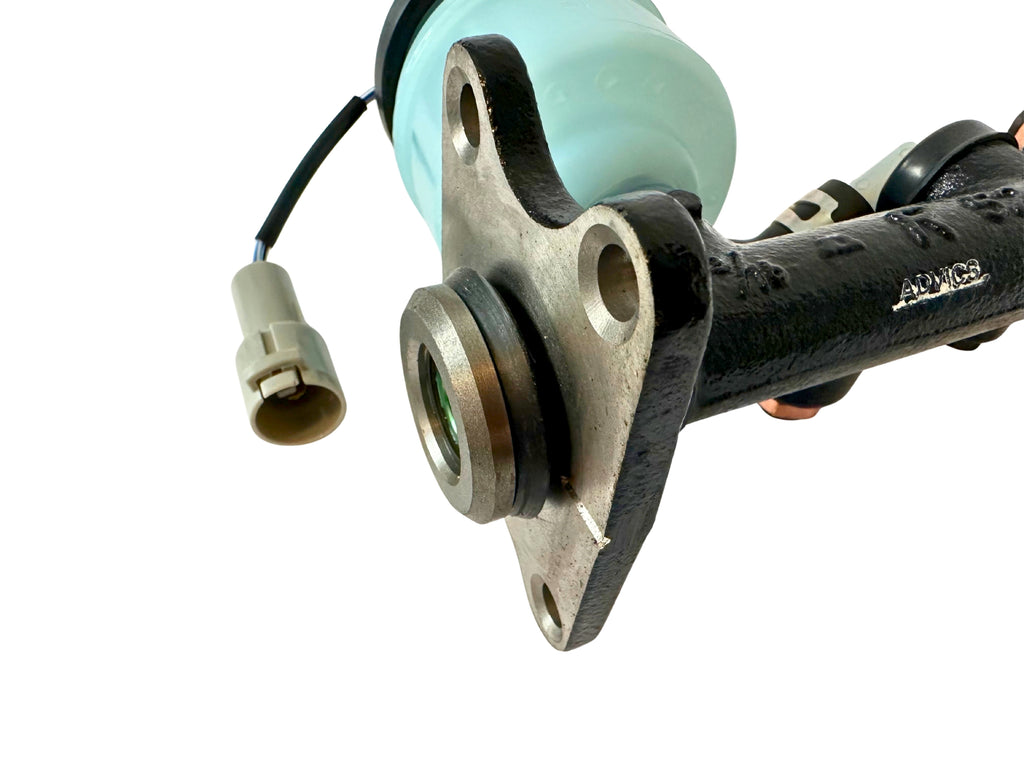 Close-up of master cylinder mount bracket and gasket with a white background