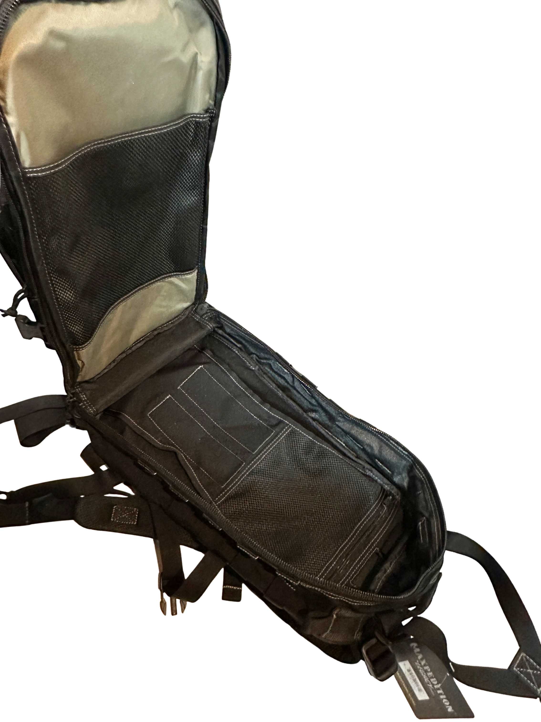 Open tactical backpack with black interior and beige exterior on a white background