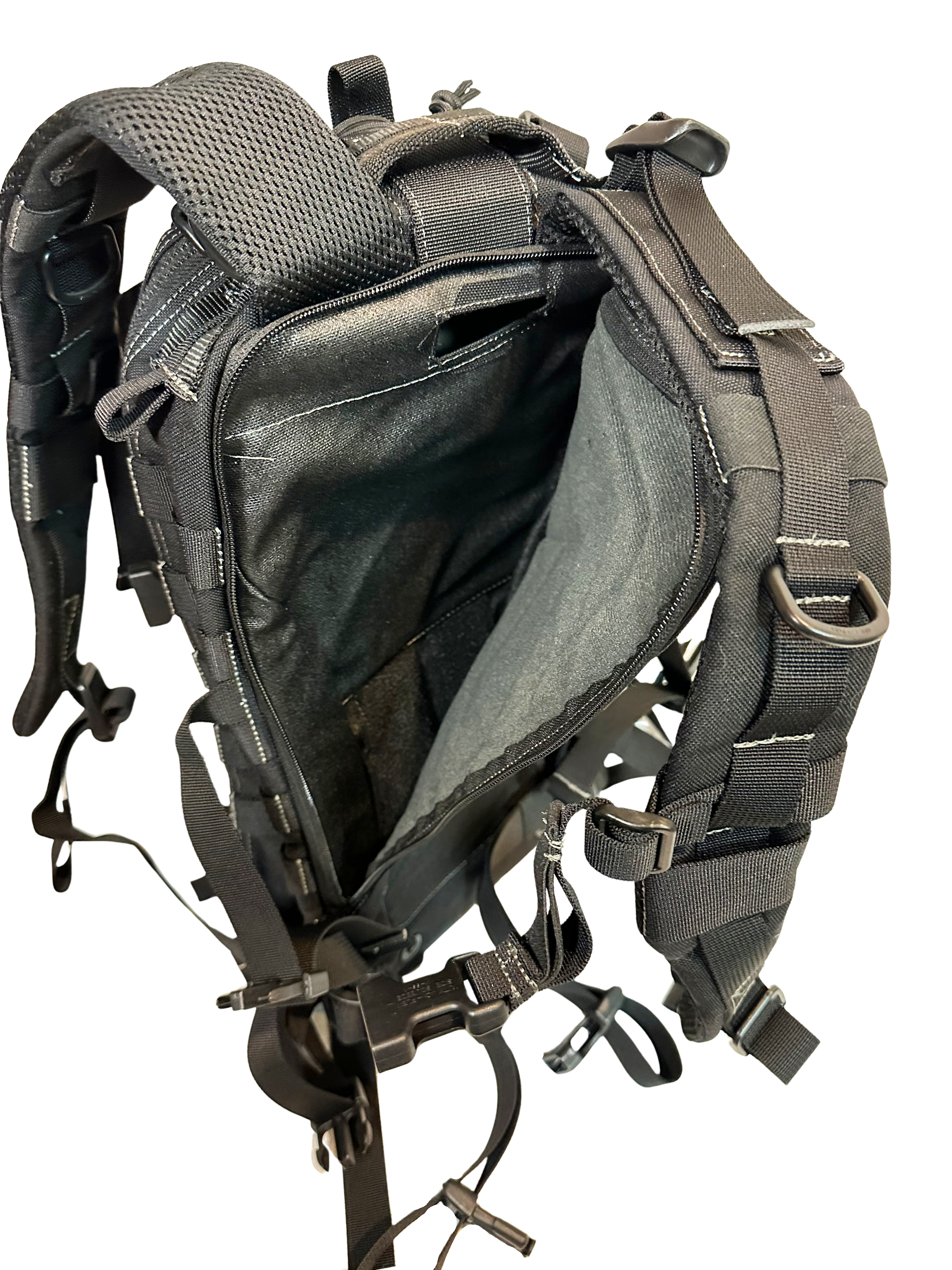 Close-up of a tactical backpack with open compartment on a white background