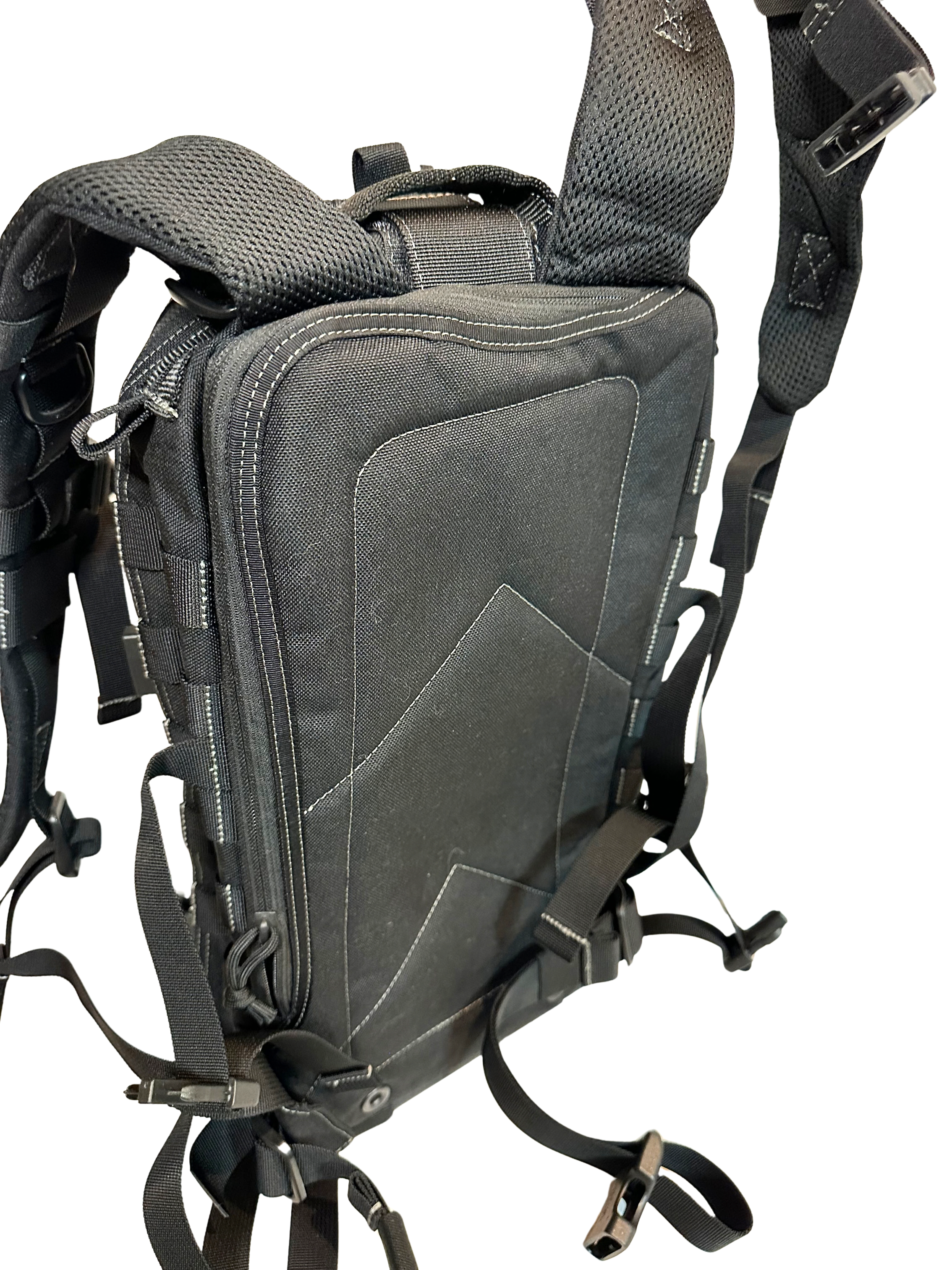 Black tactical backpack with multiple straps on a white background