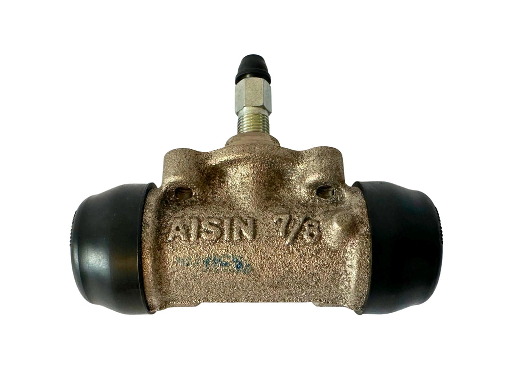 Drum brake wheel cylinder with black rubber boots on a white background